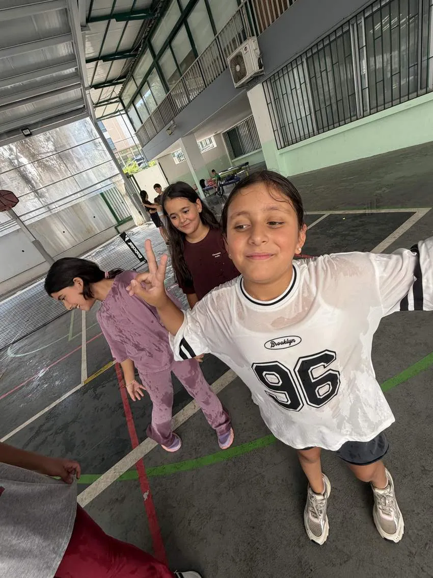 Students celebrating after a water game