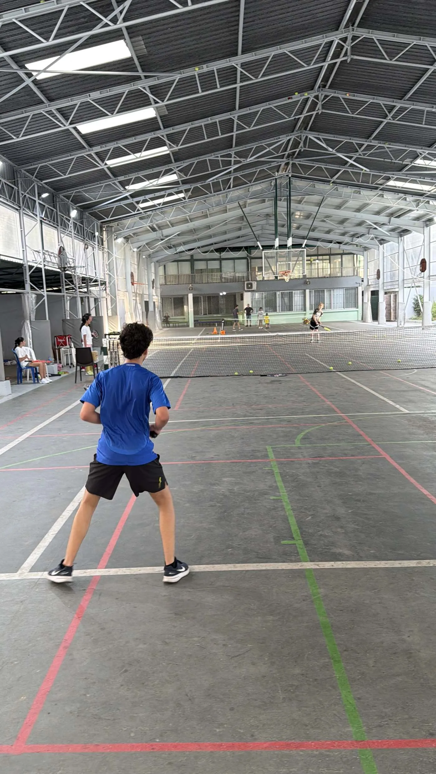 Player training on court at ProSpin Tennis Academy